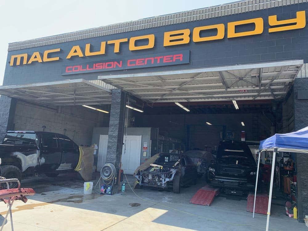 Vehicles parked at Mac Auto Collision