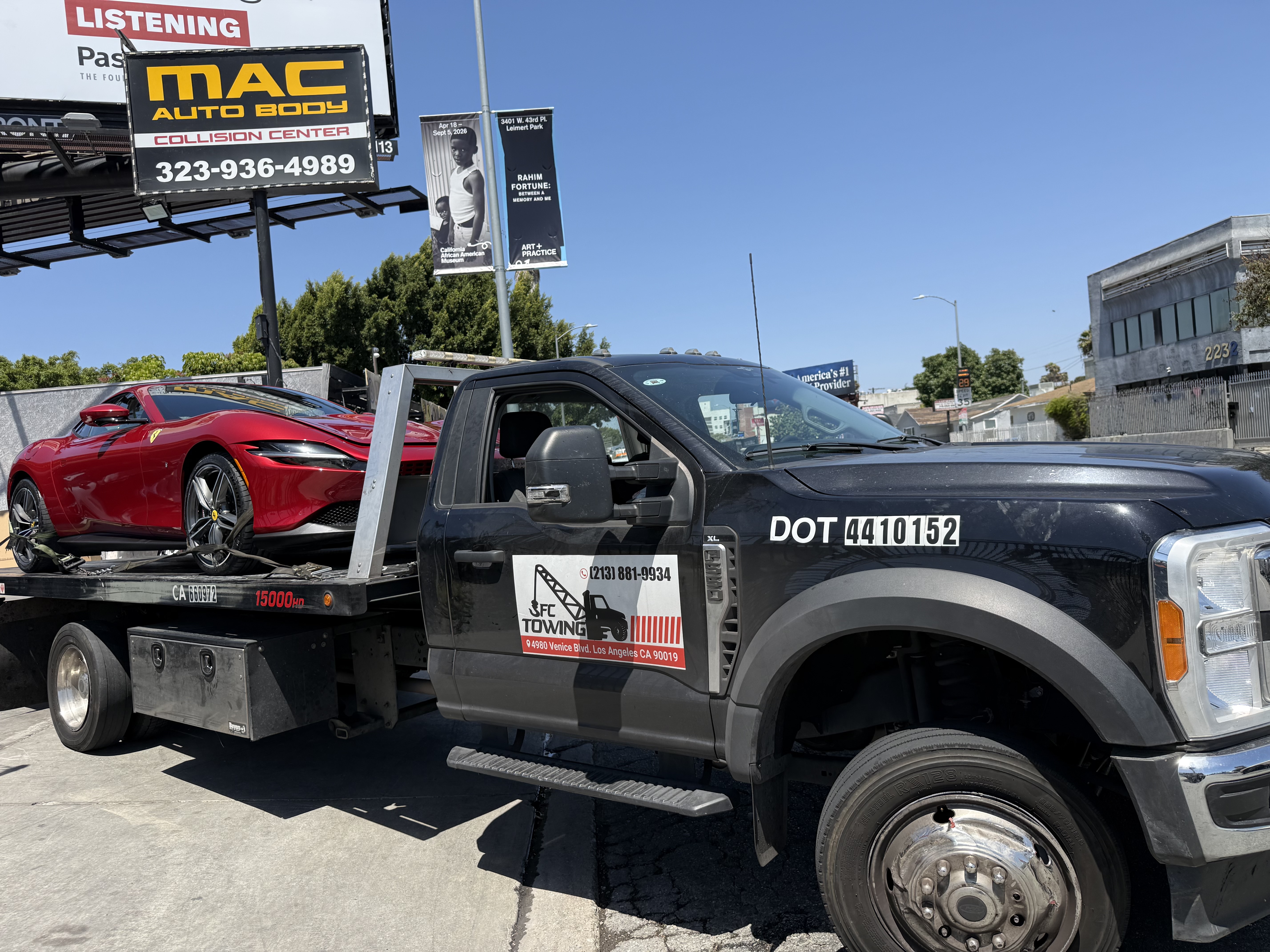 Flatbed tow truck used by Mac Auto Collision
